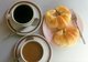 Laos: Coffee and croissants - the ubiquitous 'continental breakfast', here served in sleepy Vientiane